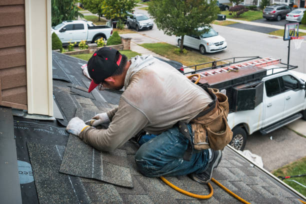 Professional Emergency Roof Repair technician working in East Tawas, MI
